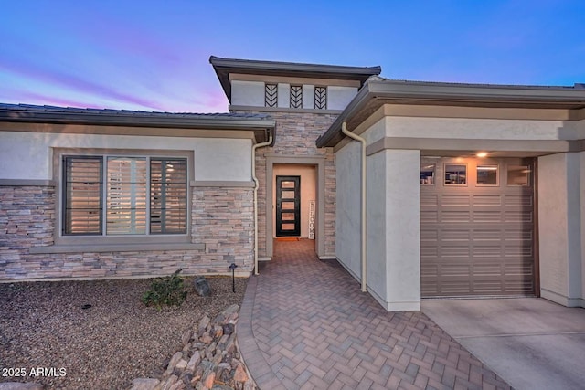 view of front of home with a garage