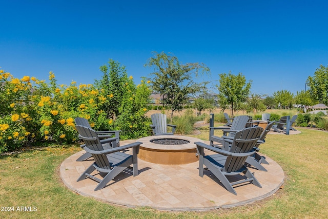 view of patio with a fire pit