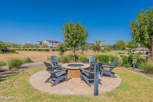 view of patio featuring an outdoor fire pit