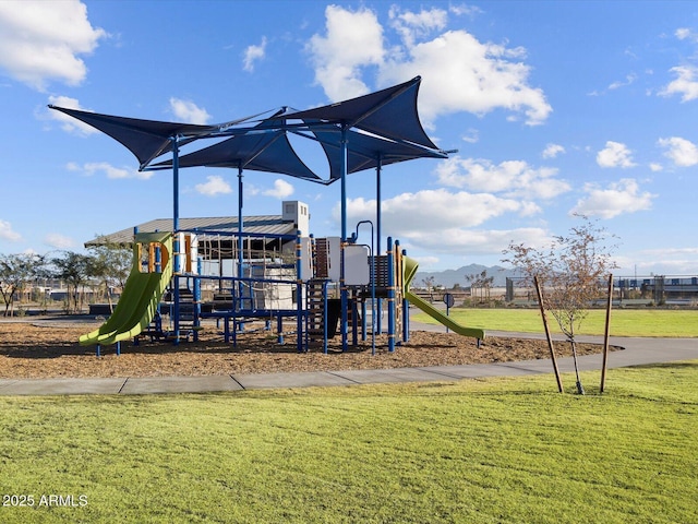 view of play area featuring a lawn