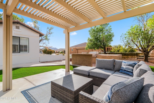 view of patio featuring an outdoor hangout area and a pergola