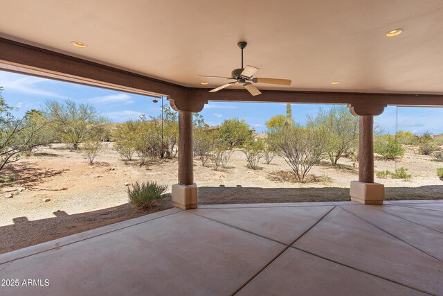 view of patio featuring a ceiling fan