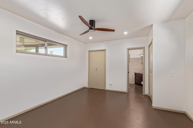 1545 E Christy Dr, Phoenix, AZ 85020 - unfurnished bedroom with concrete flooring, recessed lighting, baseboards, and ceiling fan