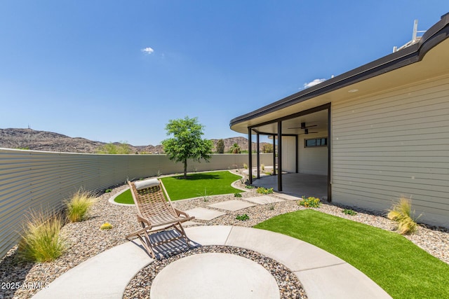 1545 E Christy Dr, Phoenix, AZ 85020 - view of yard featuring a patio area, a ceiling fan, and a mountain view