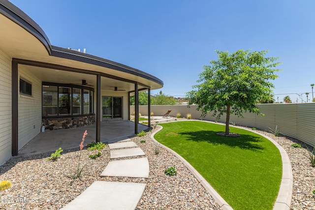 1545 E Christy Dr, Phoenix, AZ 85020 - view of yard with ceiling fan and a patio area