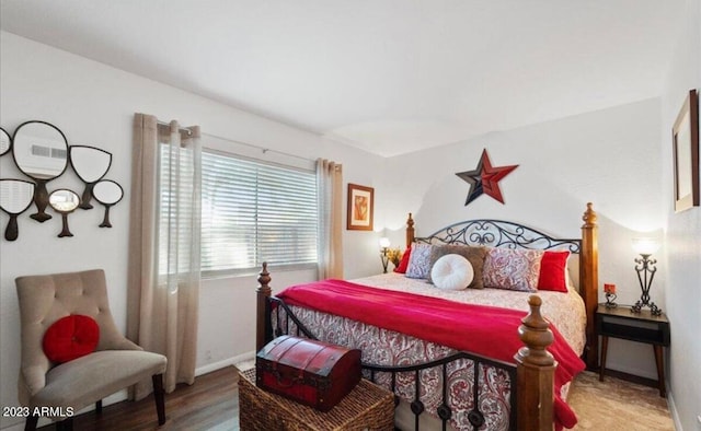 bedroom featuring hardwood / wood-style floors