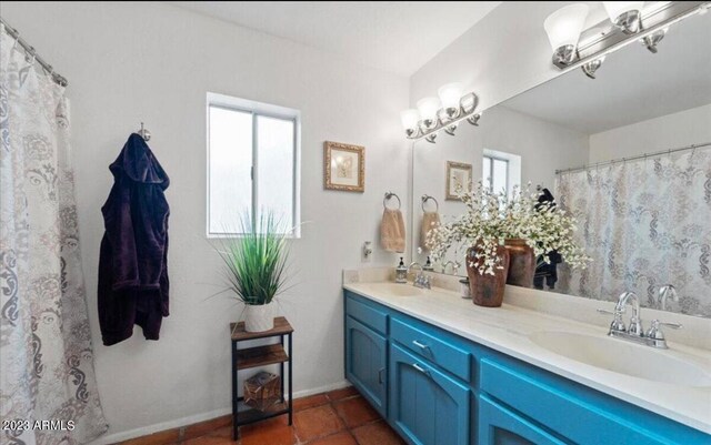 bathroom featuring tile patterned floors and vanity