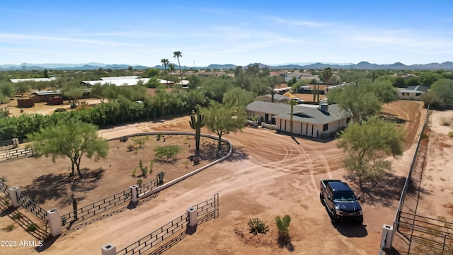 birds eye view of property featuring a mountain view