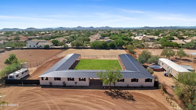 drone / aerial view featuring a mountain view