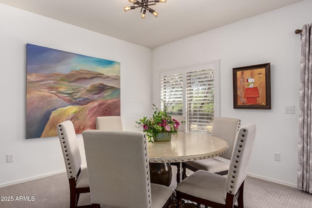 19700 N 76th St Unit 1040, Scottsdale, AZ 85255 - carpeted dining room with baseboards and a chandelier