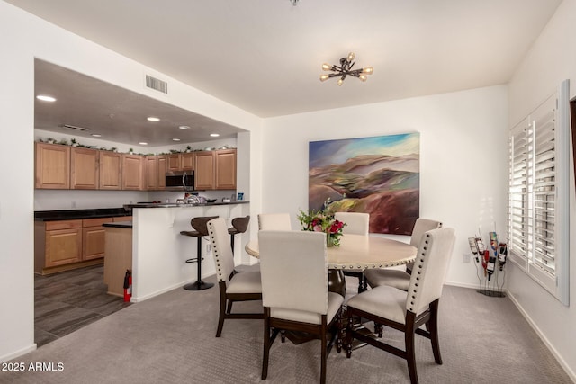 19700 N 76th St Unit 1040, Scottsdale, AZ 85255 - dining area with dark colored carpet and recessed lighting
