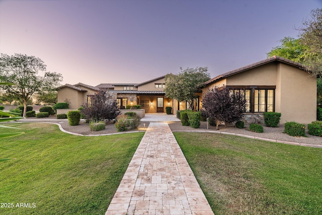 4610 E Meadowview Dr, Gilbert, AZ 85298 - view of front of home with a yard and stucco siding