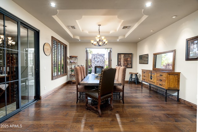 4610 E Meadowview Dr, Gilbert, AZ 85298 - dining space with a chandelier, a tray ceiling, healthy amount of natural light, baseboards, and recessed lighting