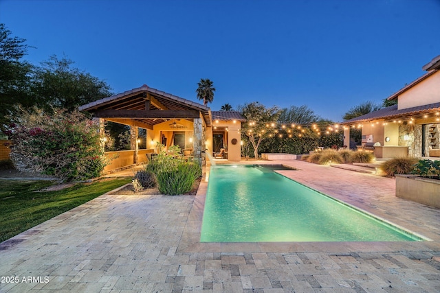 4610 E Meadowview Dr, Gilbert, AZ 85298 - swimming pool featuring ceiling fan, a patio area, and exterior kitchen
