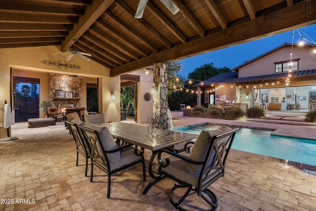 4610 E Meadowview Dr, Gilbert, AZ 85298 - view of patio featuring an outdoor stone fireplace, ceiling fan, and an outdoor pool