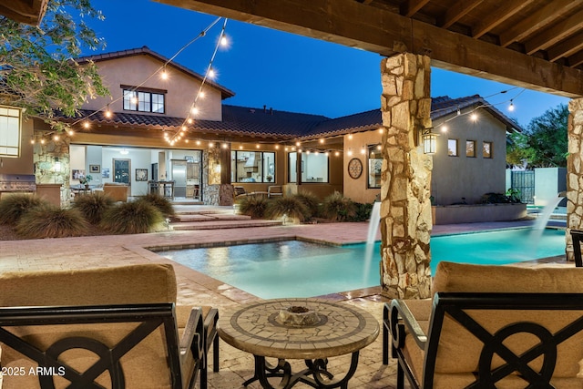 4610 E Meadowview Dr, Gilbert, AZ 85298 - pool at twilight featuring a patio area