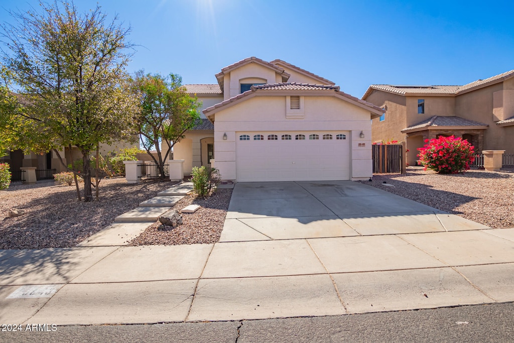 view of front of home with a garage