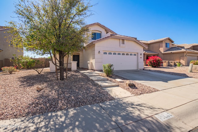 view of front of property featuring a garage