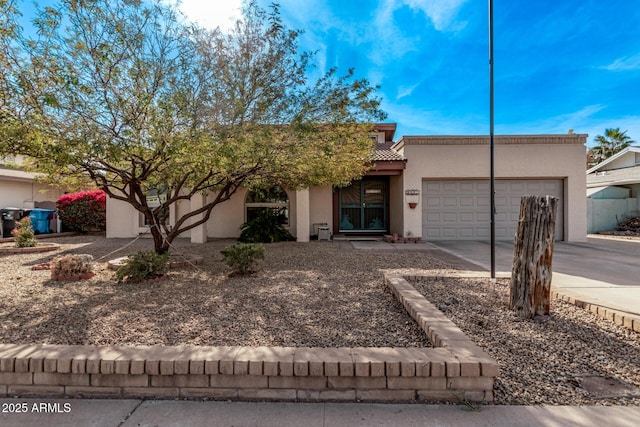 view of front of property with a garage