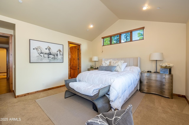 carpeted bedroom with lofted ceiling