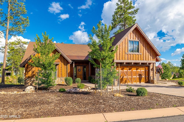 view of front of property featuring a garage