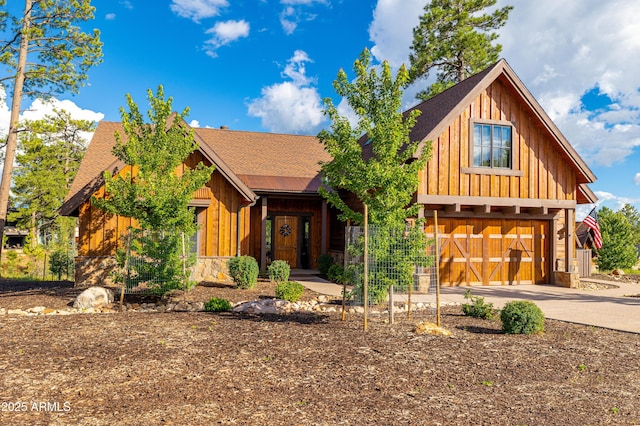 view of front of property featuring a garage