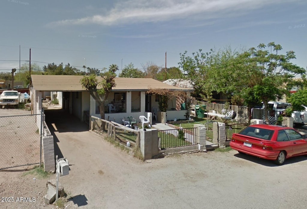 view of front of house with a carport