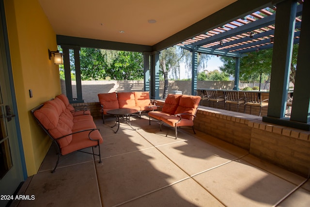 view of patio featuring a pergola and an outdoor hangout area