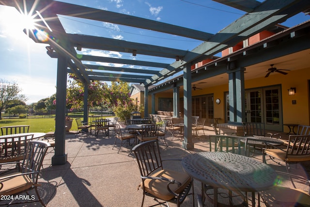 view of patio featuring a pergola and ceiling fan