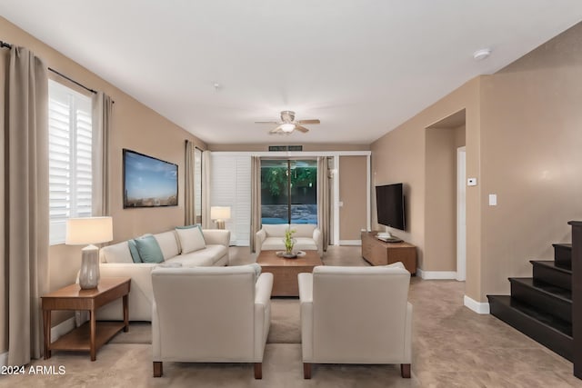 living room featuring ceiling fan