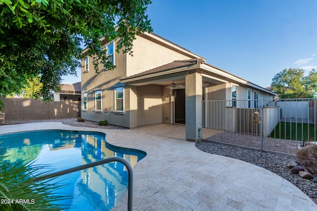 exterior space featuring a patio area and ceiling fan