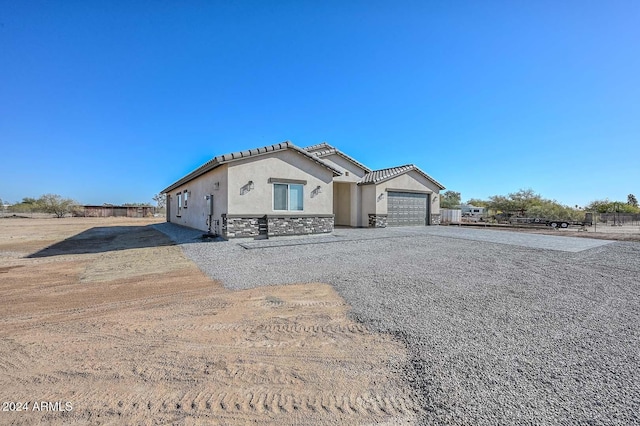 view of front of property with a garage