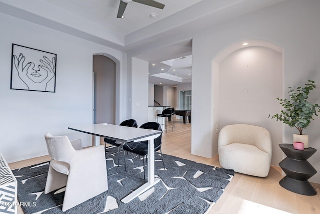11328 E Dreyfus Ave, Scottsdale, AZ 85259 - office featuring arched walkways, wood finished floors, a ceiling fan, a tray ceiling, and recessed lighting