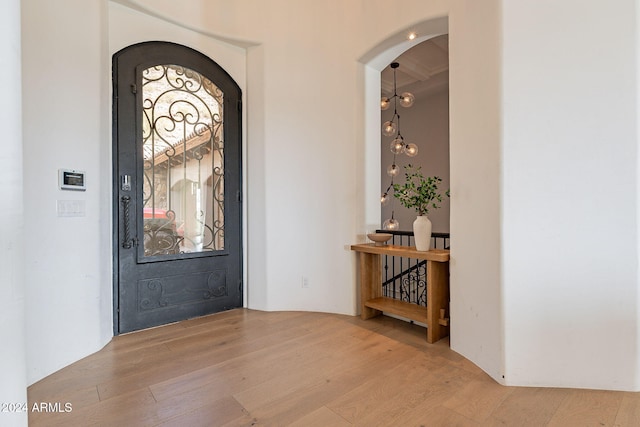 11328 E Dreyfus Ave, Scottsdale, AZ 85259 - entryway with wood finished floors and arched walkways