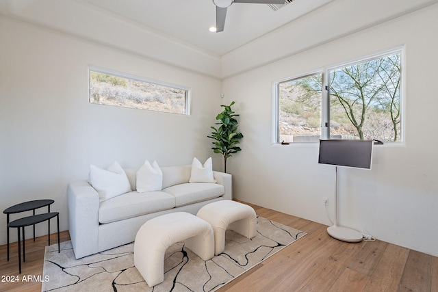 11328 E Dreyfus Ave, Scottsdale, AZ 85259 - living area featuring light wood finished floors and a ceiling fan