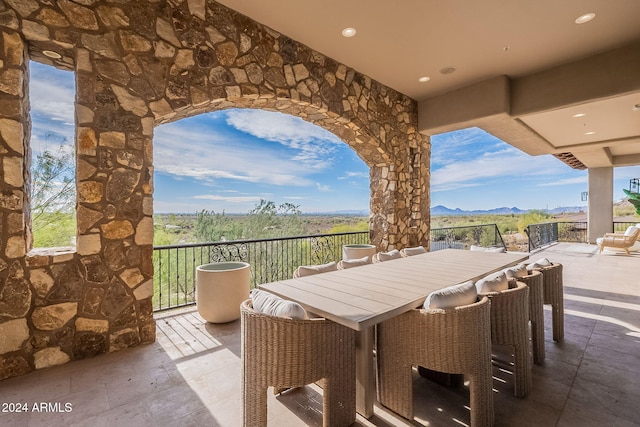 view of patio with a mountain view