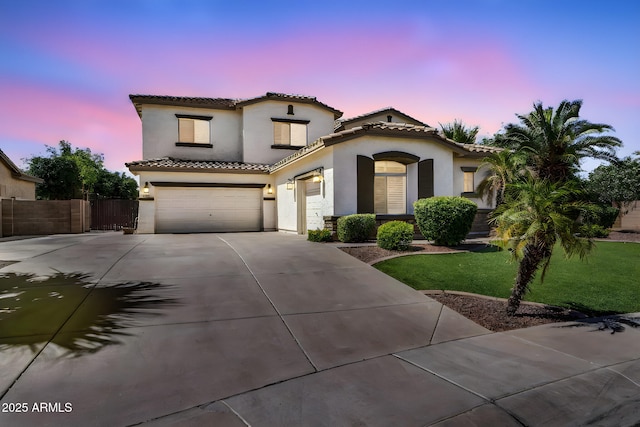 1755 E Tonto Dr, Chandler, AZ 85249 - mediterranean / spanish house with a tile roof, stucco siding, driveway, and a garage