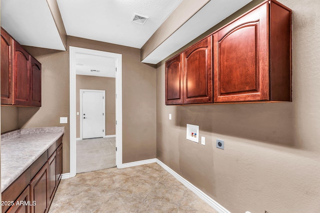 1755 E Tonto Dr, Chandler, AZ 85249 - laundry room featuring cabinet space, hookup for an electric dryer, and washer hookup