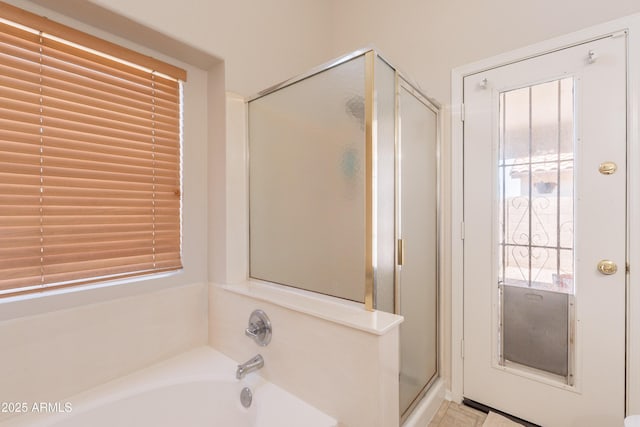 15128 W Melissa Ln, Surprise, AZ 85374 - bathroom featuring a bath and a stall shower