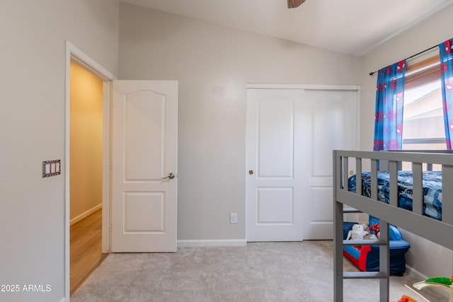 15128 W Melissa Ln, Surprise, AZ 85374 - bedroom with carpet, a closet, vaulted ceiling, and baseboards