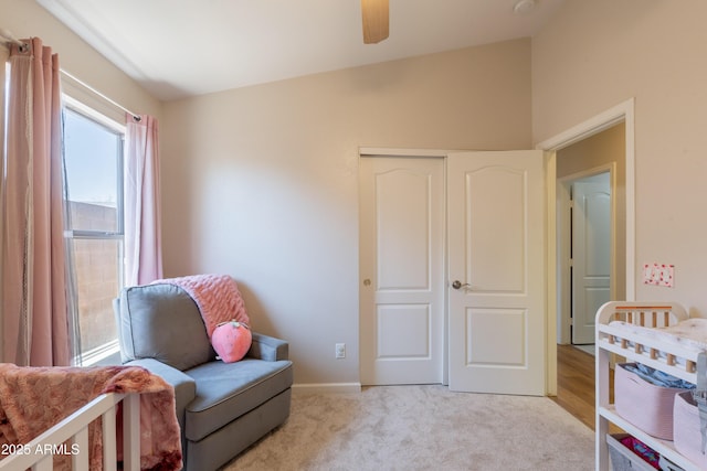 15128 W Melissa Ln, Surprise, AZ 85374 - sitting room featuring a ceiling fan, light colored carpet, and baseboards