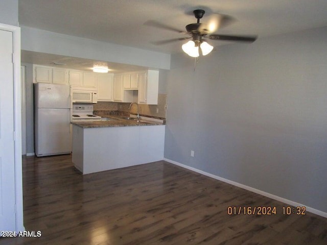 21622 N 23rd Ave Unit B 304, Phoenix, AZ 85027 - kitchen featuring a peninsula, white appliances, a sink, and dark wood-style flooring