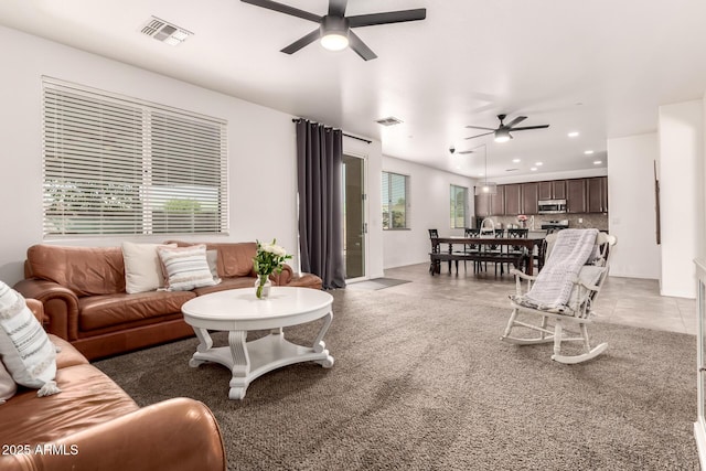 120 E Concorda Dr, Tempe, AZ 85282 - living area featuring light tile patterned floors, a ceiling fan, visible vents, recessed lighting, and plenty of natural light
