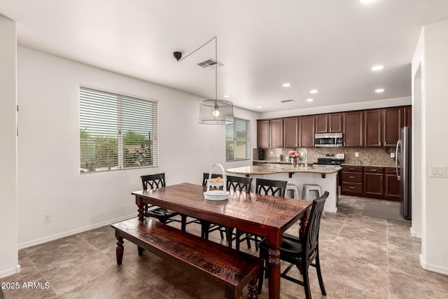 120 E Concorda Dr, Tempe, AZ 85282 - dining space featuring visible vents, baseboards, and recessed lighting