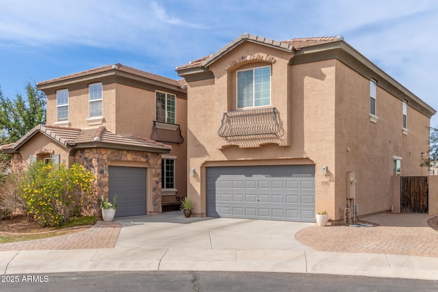 120 E Concorda Dr, Tempe, AZ 85282 - mediterranean / spanish-style home with a tile roof, stucco siding, a garage, and concrete driveway