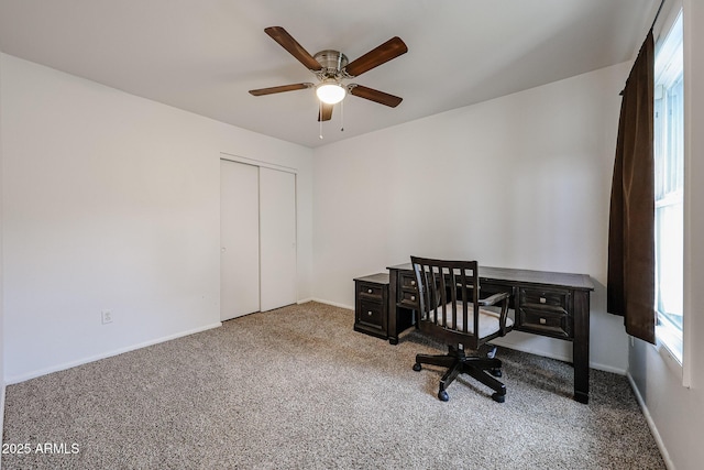 office space featuring ceiling fan and carpet flooring