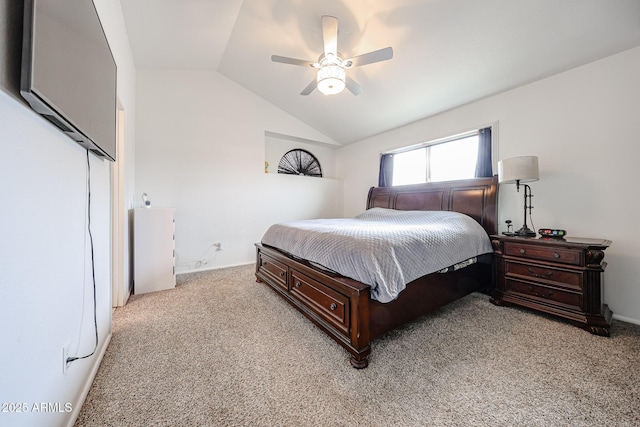 bedroom featuring light carpet, vaulted ceiling, and ceiling fan