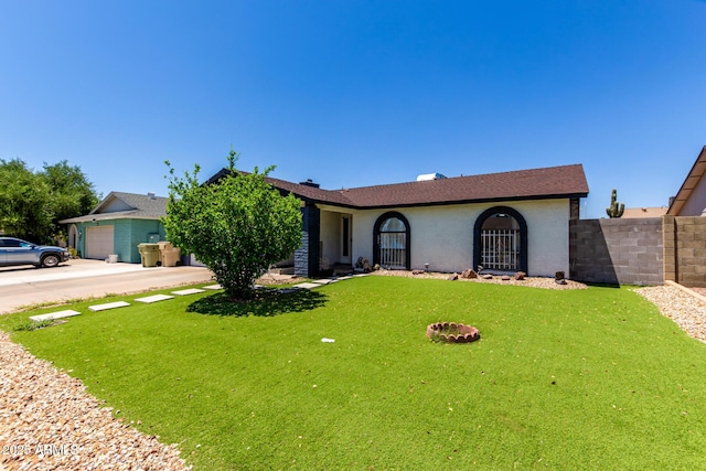 5432 W Sunnyside Dr, Glendale, AZ 85304 - view of front of property featuring driveway, stucco siding, and an attached garage