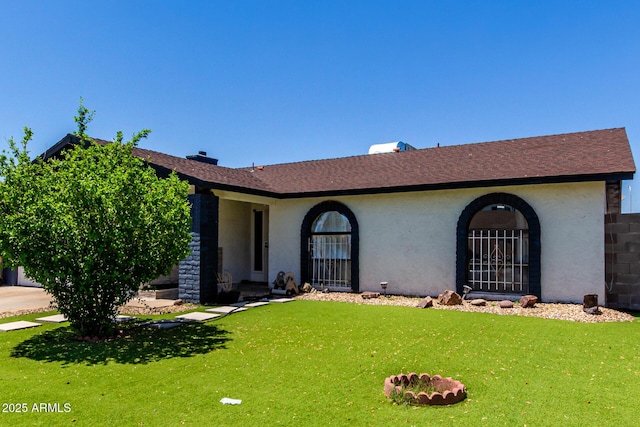 5432 W Sunnyside Dr, Glendale, AZ 85304 - view of front of property featuring a front lawn, stucco siding, and a shingled roof