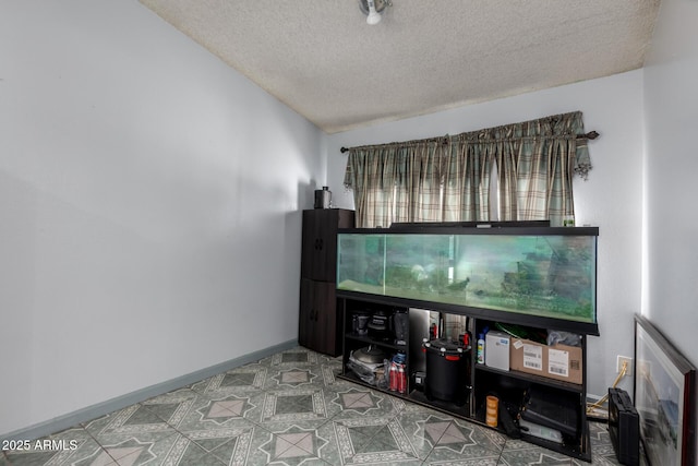 5432 W Sunnyside Dr, Glendale, AZ 85304 - living area with a textured ceiling and tile patterned floors